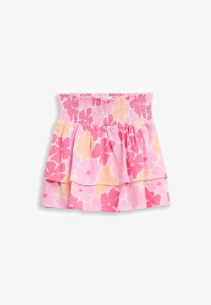 Różowa i brzoskwiniowa kwiecista spódnica warstwowa z elastycznym marszczonym pasem i zwiniętymi warstwami materiału dla rozkloszowanego fasonu.