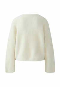 Romige, fluffy pullover sweatshirt met lange mouwen, ronde halslijn en cropped zoom. Zachte textuur, geen zichtbare sluitingen of versieringen.