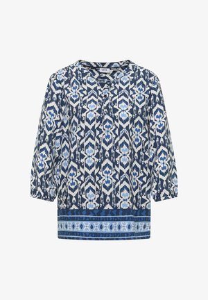 Bluzka z długim rękawem w niebieskie, białe i czarne geometryczne i kwiatowe wzory, okrągły dekolt z trzema guzikami oraz wzorzysty pas na dole.