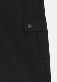 Jack & Jones Junior JPSTKARL KURTIS SNAP TECH - Cargo trousers - black