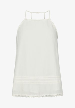 Kobieta z kręconymi włosami, ubrana w biały bezrękawnik typu halter, pokazana od tyłu na jednolitym tle.