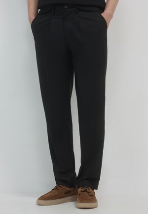 ALLA FRANCESE - Trousers - nero