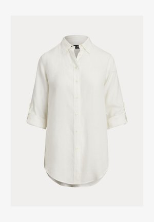 White linen shirt with a button-down design, long sleeves rolled up, curved hem, and a classic collar. Subtle texture, soft fabric.