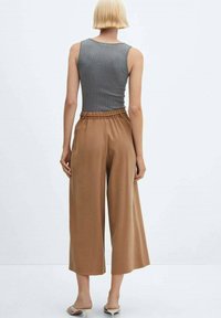 Mango - Spodnie materiałowe