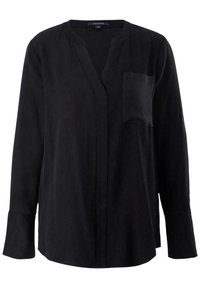 Blouse noire à manches longues avec un col en V, une poche avant et des poignets boutonnés. Fabriquée dans un tissu lisse avec une finition mate.