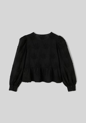 Blouse péplum noire avec manches longues bouffantes, ornée de broderies florales sur toute la surface, avec des poignets à boutons, fabriquée en tissu texturé.