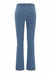 Ljusblå denim jeans med utsvängda ben och elastisk midja, som har två bakfickor och en lätt urtvättad yta.