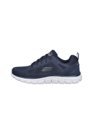 Zapatillas deportivas de malla en color azul marino con una suela blanca ligera, que presentan un upper texturizado, cierre de cordones y un lazo en el talón para facilitar su uso.