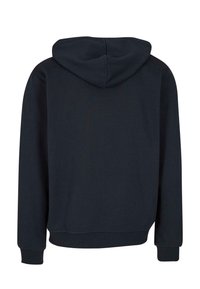 Dark blue hoodie with a soft texture, featuring a drawstring hood, long sleeves, and ribbed cuffs and hem. Simple, unembellished design.