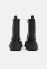 Buffalo MARS LACE UP - Platform bokacsizmák - black