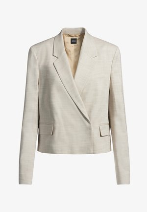 Beige, taillierter Blazer aus strukturiertem Stoff. Verfügt über einen Reverskragen, eine doppelte Knopfleiste und zwei Fronttaschen.