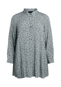 Light green long-sleeve shirt with a collared neck, featuring a button-down front and small black floral patterns throughout. Soft fabric texture.