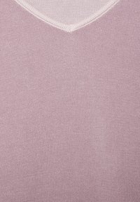 V-neck sweater in soft, light pink knit fabric, featuring a textured pattern and subtle ribbing along the neckline. Smooth finish.