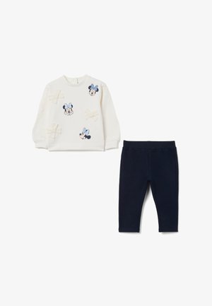 El conjunto incluye un sudadera de color crema con diseños de Minnie Mouse y leggings de color navy oscuro. La sudadera presenta lazos bordados y una tela suave.
