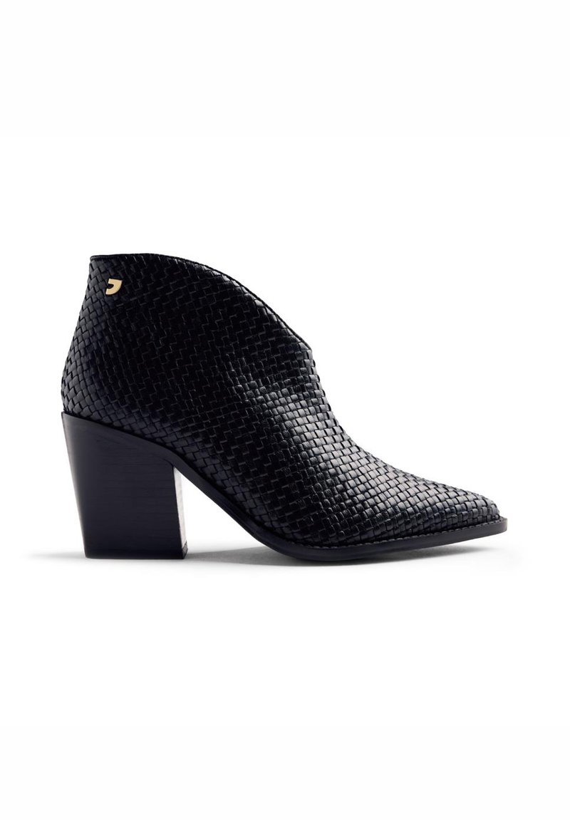 Black woven leather ankle boot with pointed toe and chunky mid-height heel, featuring a small gold logo detail near the top.