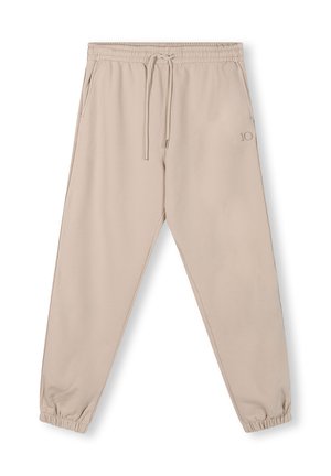 Pantaloni sportivi beige con vita elasticizzata, cordoncino regolabile e polsini a gamba affusolata. Presenta un piccolo logo in rilievo sul lato.