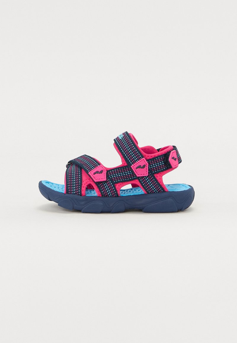 Navy and pink sports sandals with adjustable straps, textured fabric upper, cushioned blue footbed, and a durable, contoured sole.