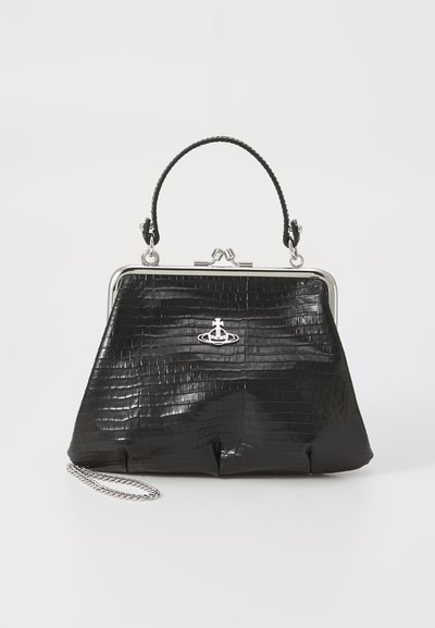 Black faux crocodile leather handbag with a silver frame, top handle, and detachable chain strap. Features a logo accent on the front.