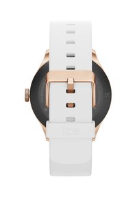 Orologio con cinturino in silicone bianco, caratterizzato da un quadrante rotondo nero e dettagli in oro rosa. Il cinturino presenta diversi fori e una chiusura con fibbia sicura.