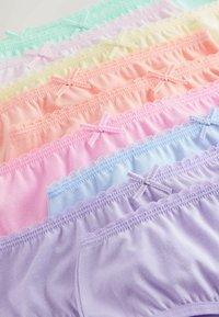Seven pastel-colored women's underwear with lace trim and small bows, arranged in a layered, overlapping layout.