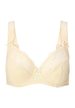Bezešvá podprsenka v béžové barvě s krajkovými lemy a květinovým vzorem, hladké košíčky, nastavitelné ramínka a mašličky na středu a ramínkách.