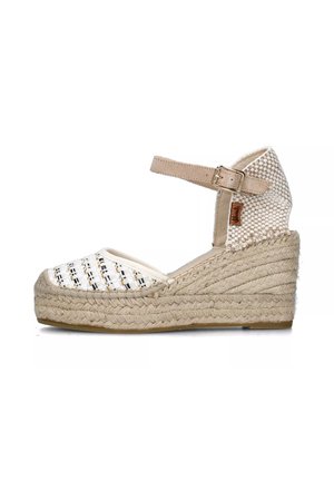 Sandalo con zeppa espadrille con cinturino alla caviglia beige, tomaia in tessuto intrecciato bianco e nero e piattaforma avvolta in juta, con design a punta rotonda.