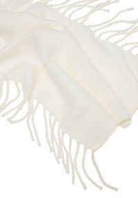 Sciarpa bianca morbida con bordi frangiati. Realizzata in un tessuto leggero e testurizzato, presenta una finitura liscia e una delicata lavorazione con frange.