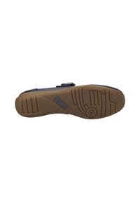 Black footwear with a textured rubber sole, featuring a patterned tread design. The brand "Josef Siebel" is embossed on the side of the sole.
