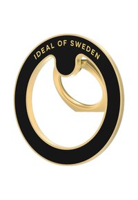 Kultainen pyöreä puhelimen pidike mustalla keskellä, jossa on teksti "IDEAL OF SWEDEN" ylhäällä ja hieman karkea pinta.