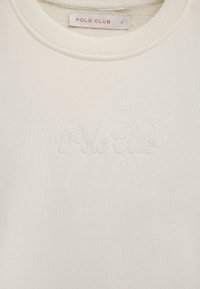 Felpa girocollo color avorio con la scritta "Polo Club" ricamata sul petto e un'etichetta Polo Club all'interno del colletto, taglia piccola.