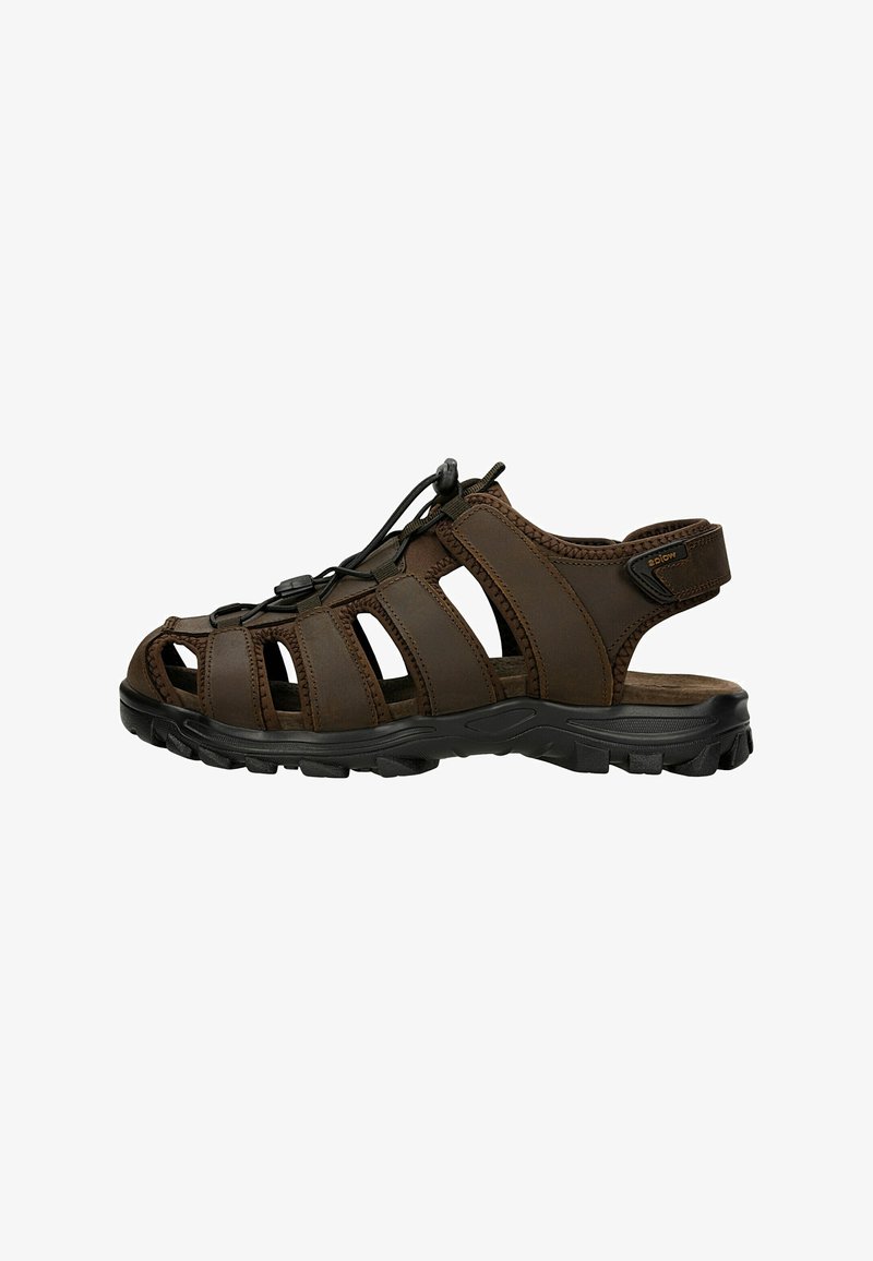 Brown leather sandal featuring a closed toe, multiple adjustable straps, a cushioned sole, and a textured rubber outsole for grip.
