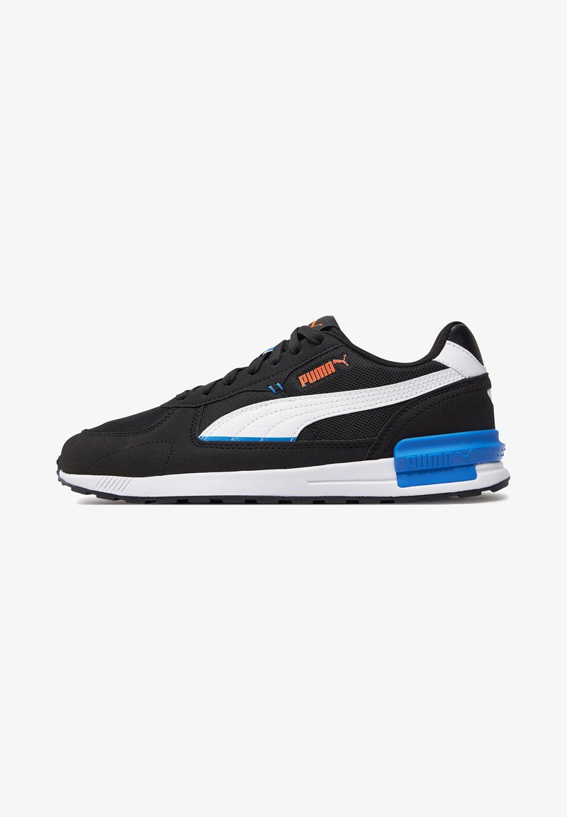 Black sneaker with mesh and suede materials. Features white and blue accents, a thick sole, and visible branding in orange.