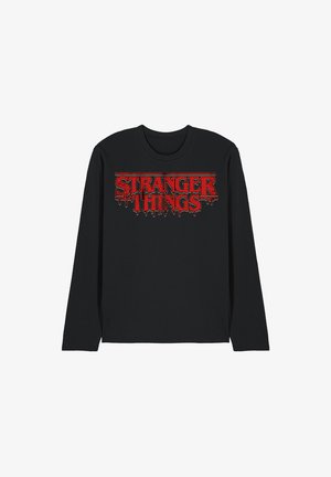 Long-sleeve black t-shirt featuring a red "STRANGER THINGS" logo with dripping effects, round neckline, and soft cotton material.