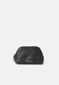 Black leather coin purse with a textured finish, rounded shape, zip closure, and silver hardware. Subtle logo embossed on the front.
