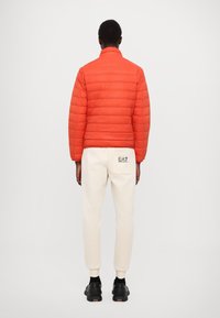 EA7 Emporio Armani TRAIN CORE JACKET - Piumino - summer fig