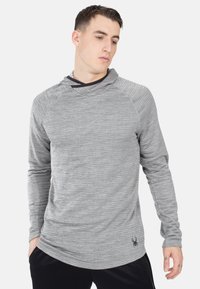 Hellgraues Langarm-Hoodie-Shirt mit einer melierten Textur. Verfügt über einen abgerundeten Saum und ein Logo an der unteren Vorderseite. Entworfen mit einer lockeren Passform.