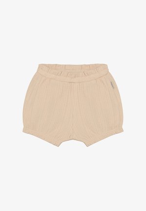 Beige ribbed shorts with an elastic waistband, featuring a soft texture and loose fit, designed for comfort and ease of movement.