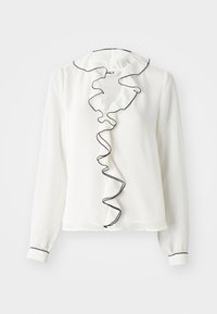 White long-sleeve blouse with a ruffled collar and placket outlined in black. Soft texture, regular fit, elastic cuffs.