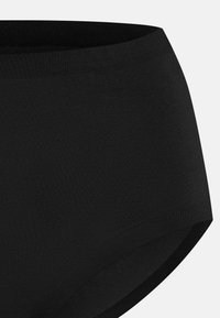Culotte nera in cotone con una texture liscia e elasticizzata. Design a vita alta, con un aspetto senza cuciture e senza hardware o dettagli visibili.