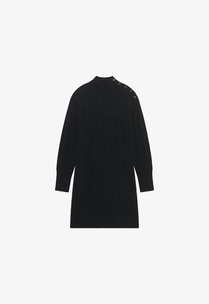 Zwarte gebreide jurk met een hoge halslijn, lange mouwen en een diamanten patroon. Kenmerkt knopen op de schouder en geribbelde manchetten.