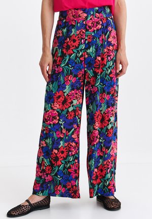 - Spodnie materiałowe