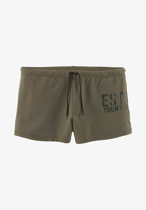 Grüne Badehose aus glattem Material mit Kordelzugbund, versehen mit dem Text "EST. THUNDERBOLT" in einem verwitterten schwarzen Druck.