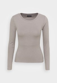Maglia a maniche lunghe a coste grigia chiara con scollatura rotonda. Forma aderente con texture morbida, caratterizzata da un'etichetta al colletto.