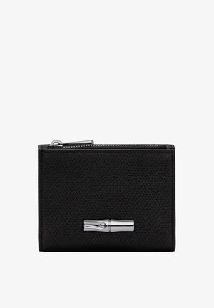 Black leather wallet with a textured surface, featuring a silver hardware accent and a zip closure on top. Compact rectangular design.