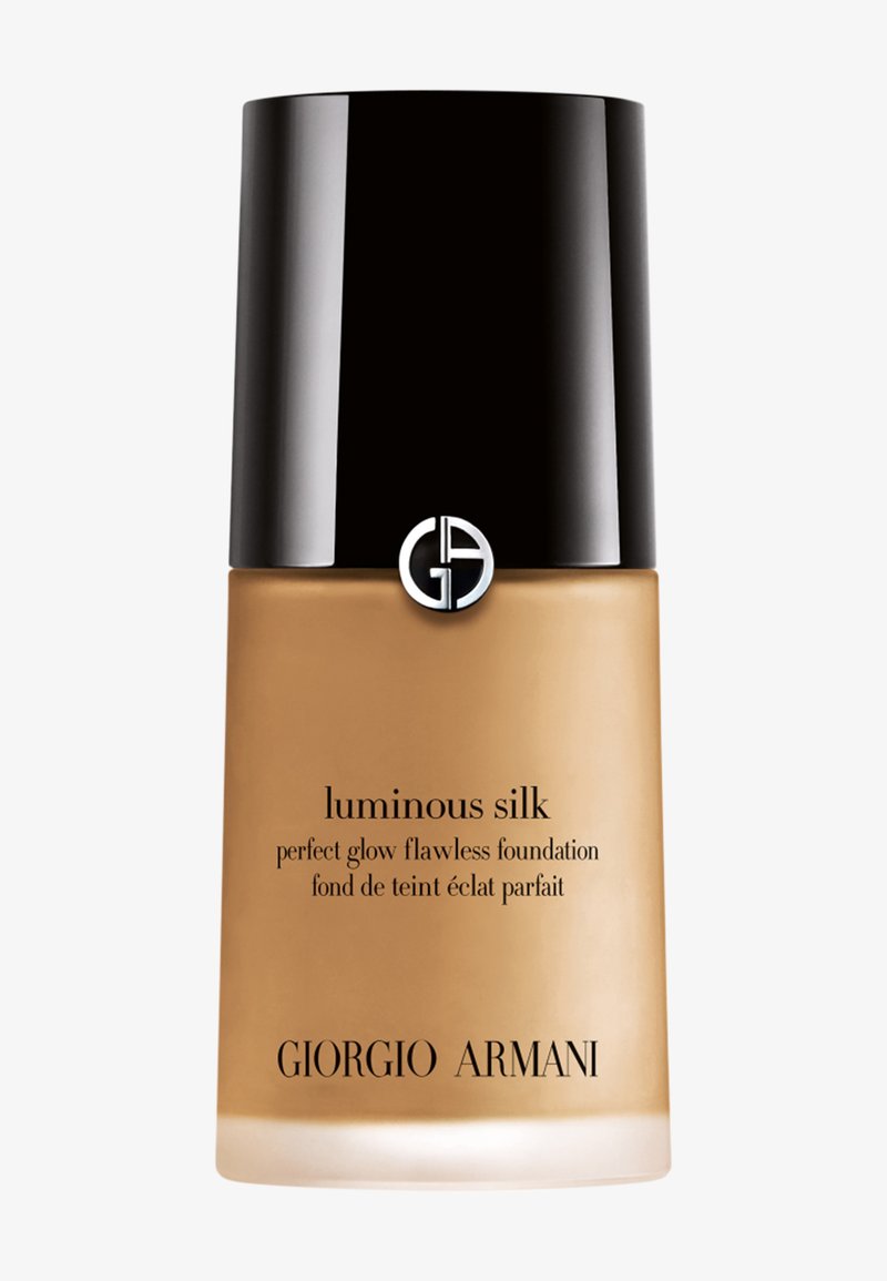 Flaske med Giorgio Armani Luminous Silk perfekt glød feilfri foundation med svart lokk og logo på beige bakgrunn.