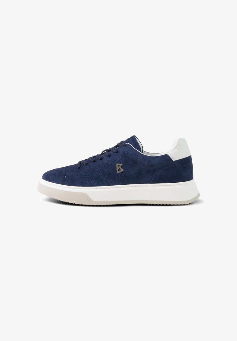Navy blue suede sneaker with white heel tab, black laces, perforated sides, metal "B" logo, and thick white rubber sole.
