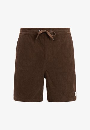 Bruine corduroy shorts met een elastische tailleband en trekkoord, voorzien van een klein wit merklipje nabij de zoom aan het rechterbeen.