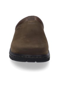 Brown slip-on shoe with a smooth leather upper and a textured accent at the heel. Features a thick black rubber sole and stitching detail.