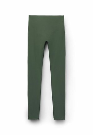 Green leggings made from smooth, stretchy material. High waistband, full-length, with minimal seams and a solid color design.