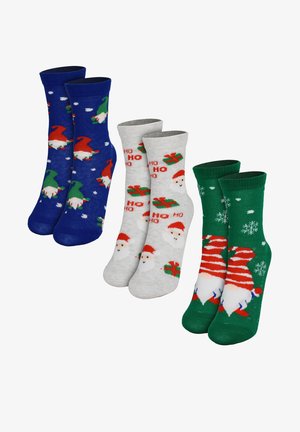 Four pairs of holiday-themed socks: blue with gnomes, gray with Santa, green with snowflakes, and red-striped Santa design. Cotton blend.